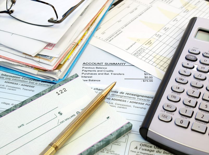 checks, pencil, calculator, bills