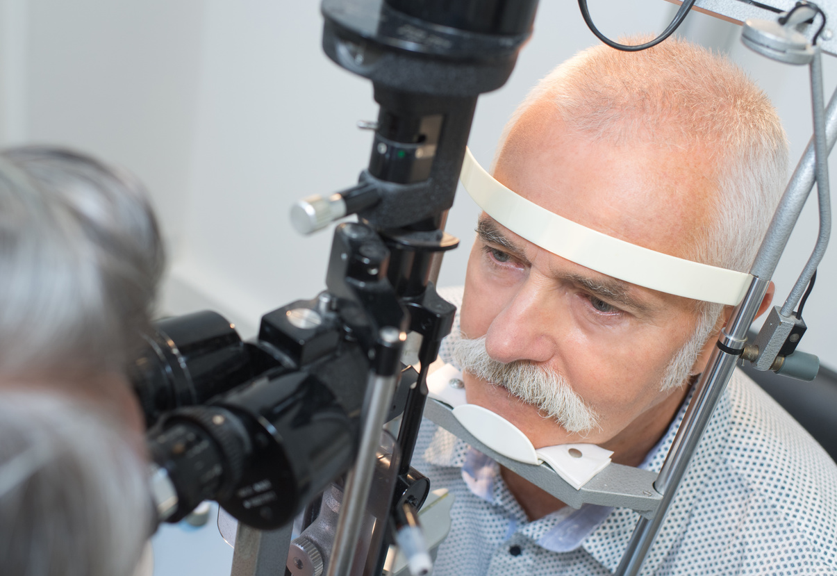 man having eye exam