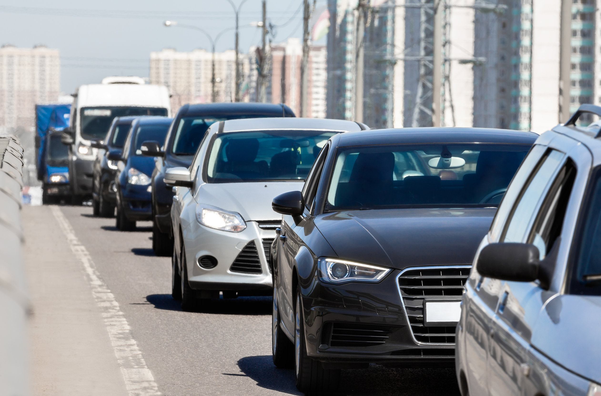 cars lined up on road heavy traffic