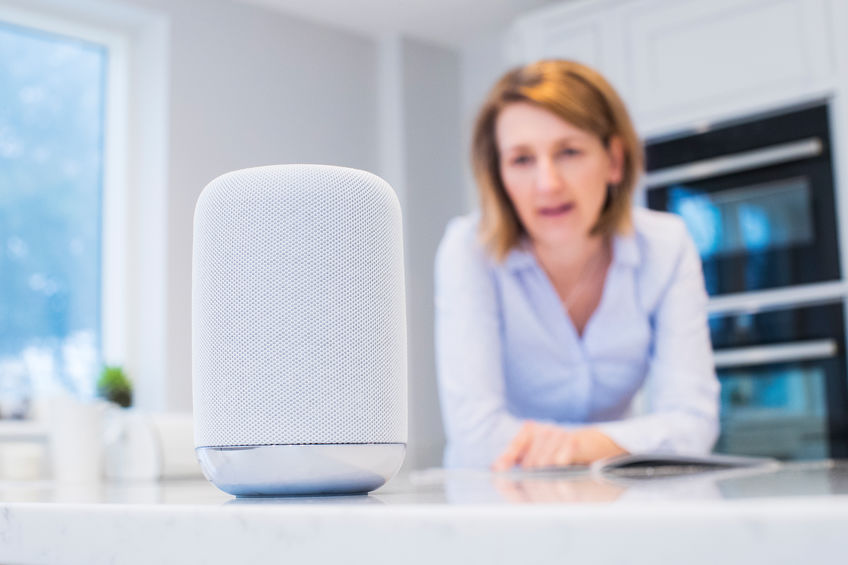 woman in kitchen with amazon echo