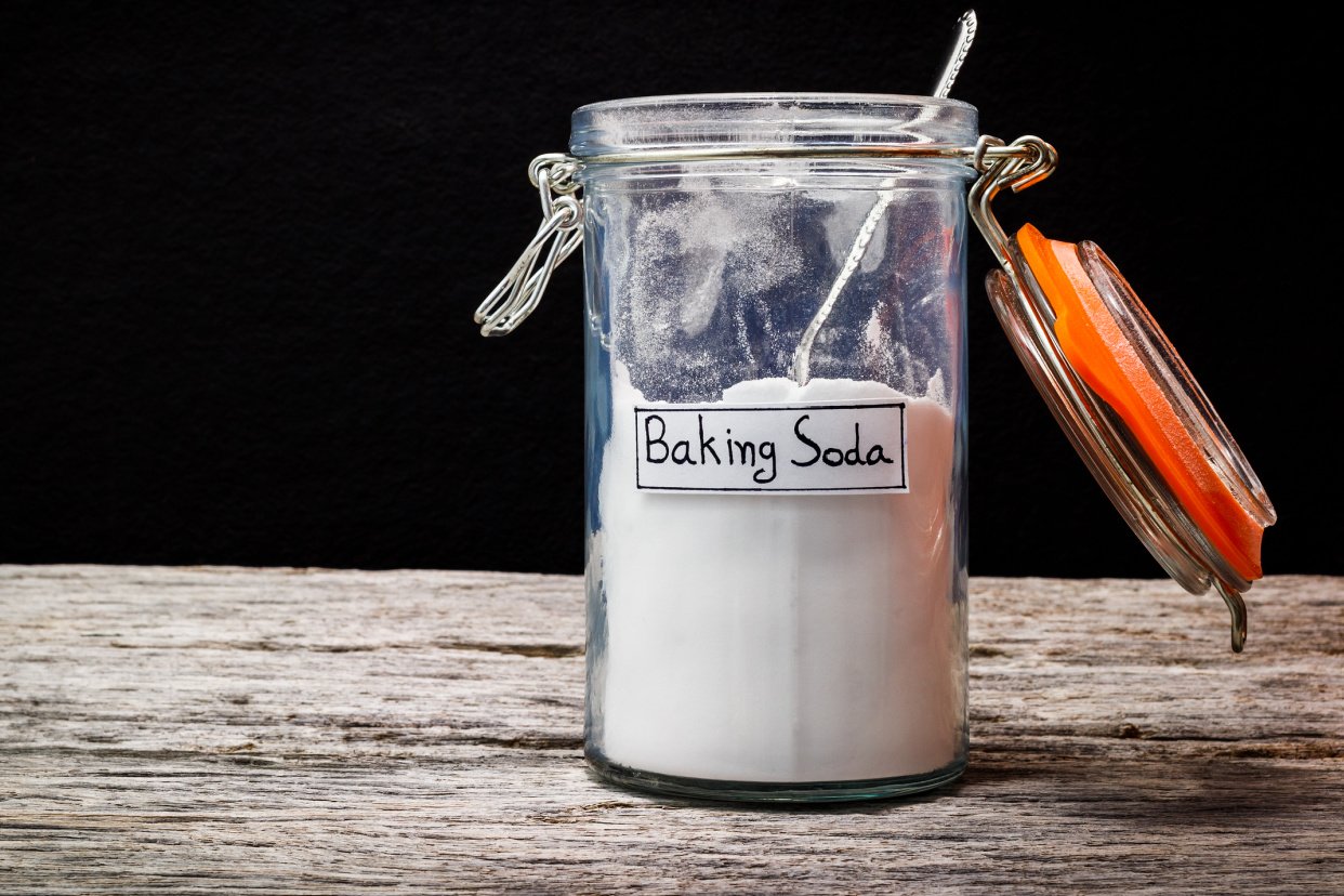 baking soda in a clear jar with a label