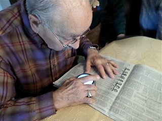 Turn your newspaper into a large print newspaper with a dome reading magnifier