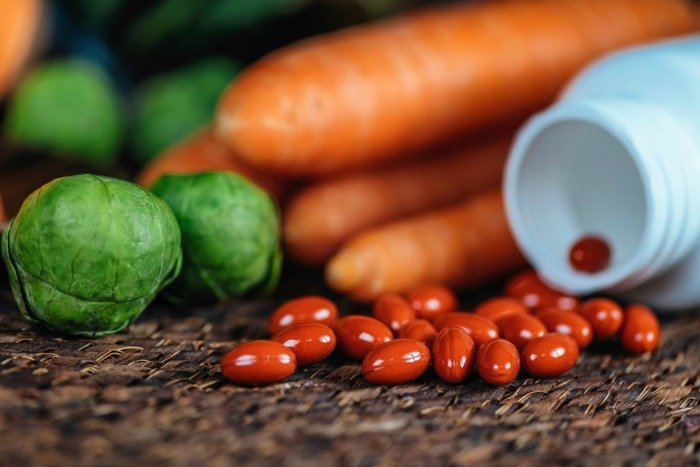 lutein supplements with carrots and brussel sprouts
