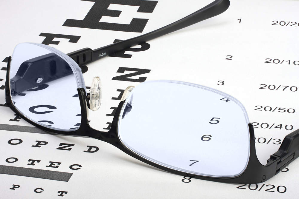 black glasses on eye chart